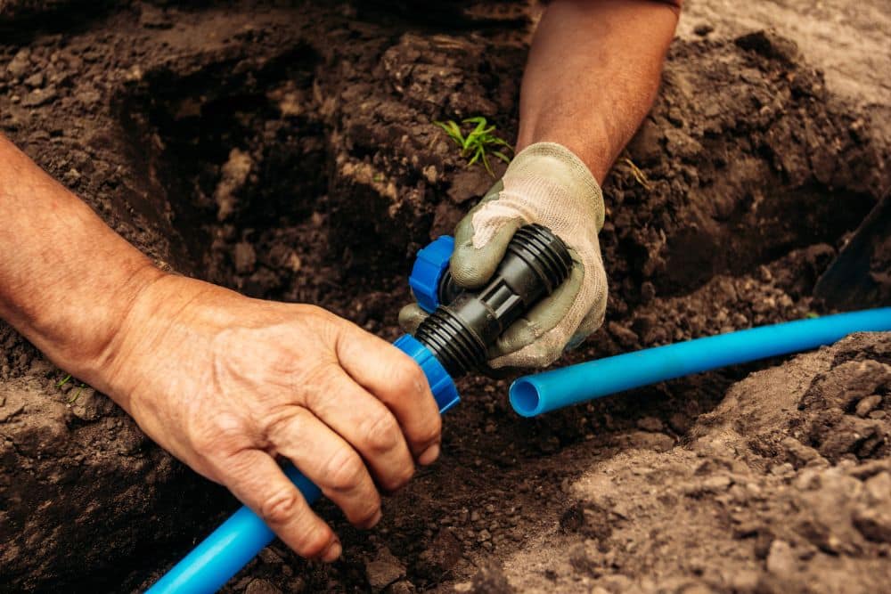 contractor assembling sprinkler