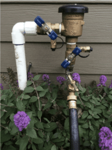 Backflow preventer in yard irrigation system