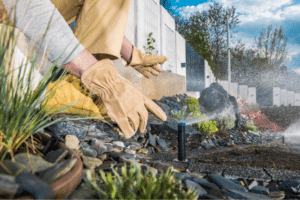 Automatic sprinkler system being installed in a home lawn as part of an irrigation project related to irrigation permit cost