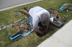 Residential irrigation backflow preventer installed to meet backflow preventer code requirements