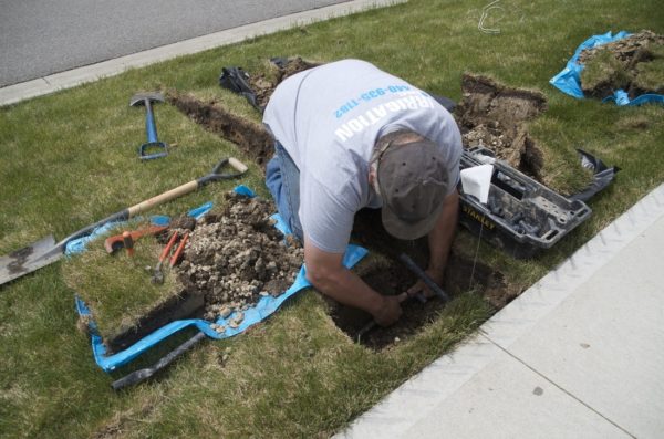 Residential irrigation backflow preventer installed to meet backflow preventer code requirements
